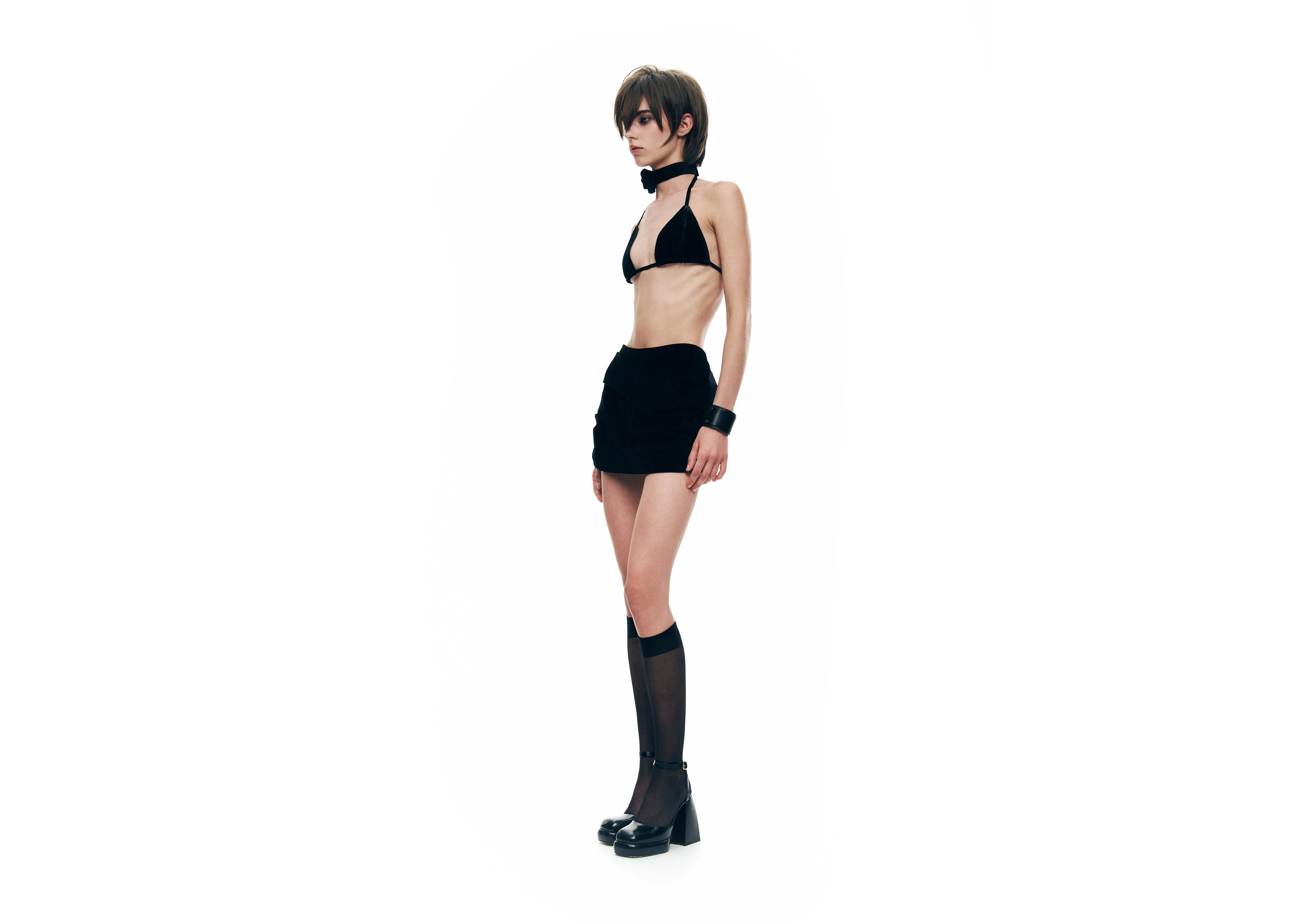 Short trousers with draped velvet panel